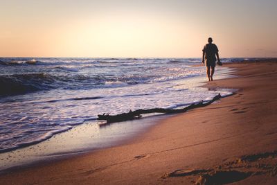 Silhouette of people on beach