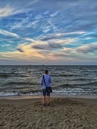 Scenic view of sea against cloudy sky