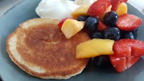 Close-up of fruits in plate