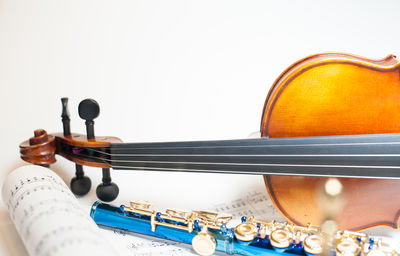 Close-up of piano against white background