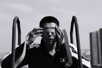 Low angle view of people against sky