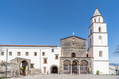 View of building against clear blue sky