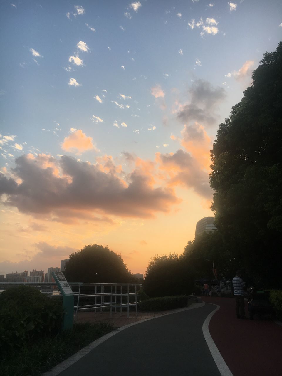 ROAD AGAINST SKY DURING SUNSET