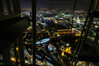 High angle view of city buildings at night