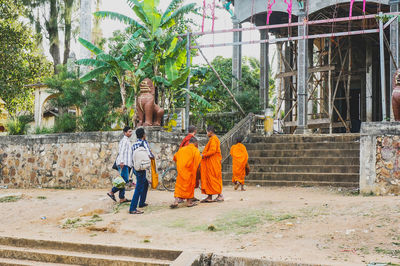 People in front of building