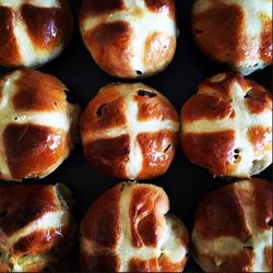 Full frame shot of hot cross buns on baking tray