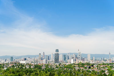 Cityscape against blue sky