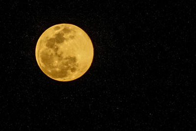 Low angle view of moon in sky