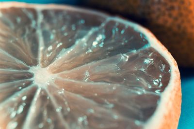 Close-up of lemon slice on table