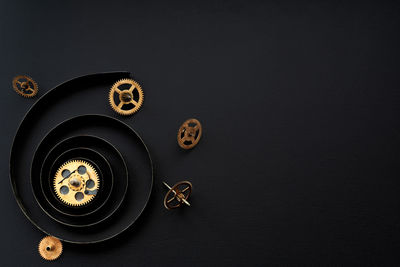 High angle view of camera on table against black background