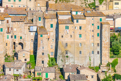 Cityscape of the medieval little town of sorano in tuscany during a summer sunset.