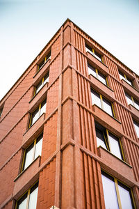 Low angle view of modern building against clear sky