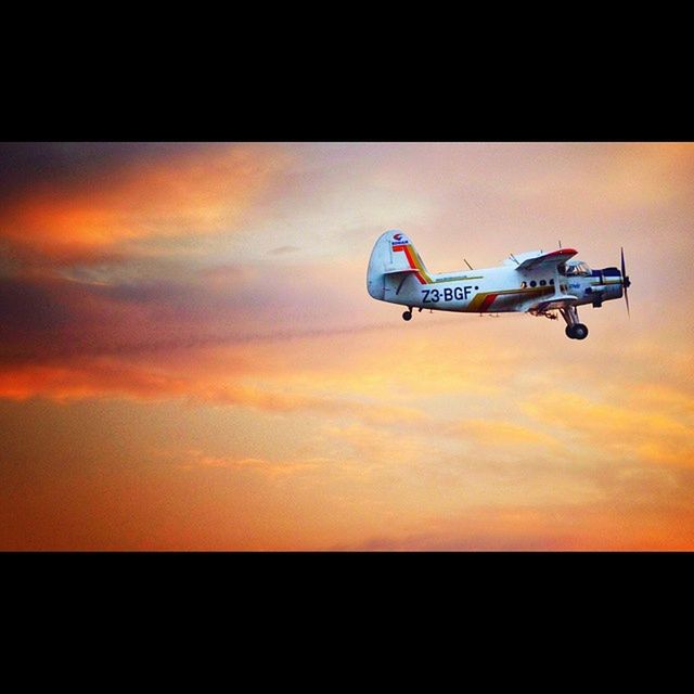 transportation, mode of transport, sunset, airplane, air vehicle, orange color, sky, transfer print, flying, mid-air, travel, journey, on the move, auto post production filter, land vehicle, silhouette, cloud - sky, sun, public transportation, scenics