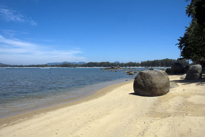 Scenic view of beach against clear sky