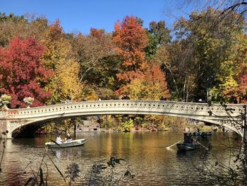 Bridge over river during autumn