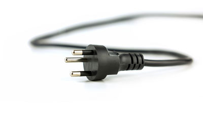 Close-up of vintage car on white background