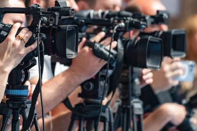Close-up of man with camera
