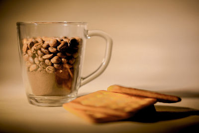 Close-up of coffee and drink on table