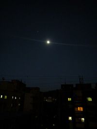 Low angle view of buildings at night