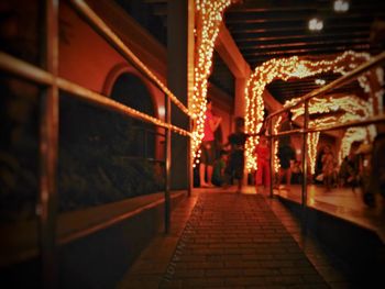 Illuminated lanterns hanging at night