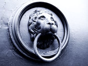 Close-up of sculpture on door