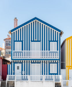 Low angle view of building against clear blue sky