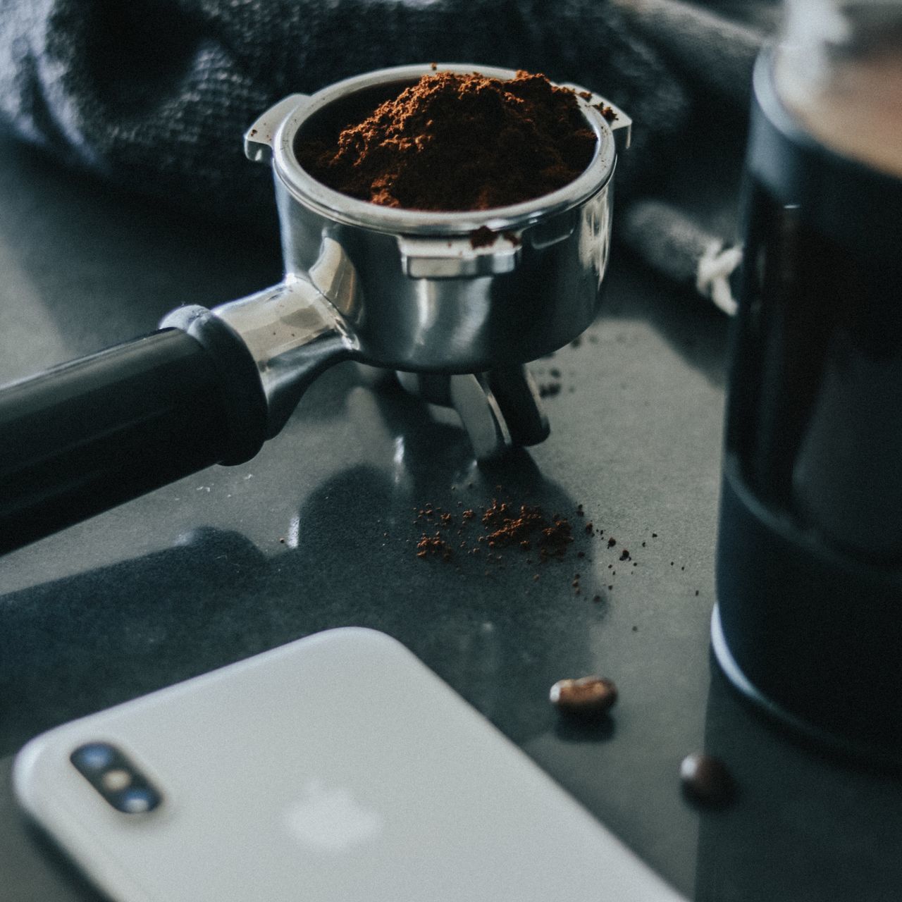 HIGH ANGLE VIEW OF COFFEE CUP ON TABLE AT HOME