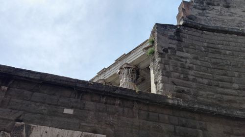 Low angle view of old building against sky