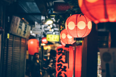 Close-up of lantern hanging at night