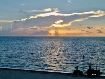 Panoramic view of the beach with the sea in the background during sunset