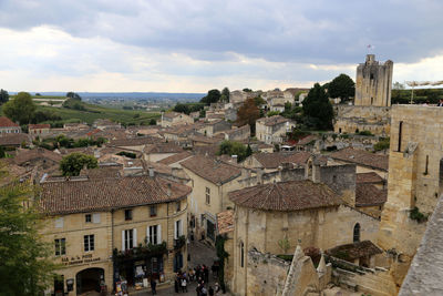 High angle view of old town against buildings in city