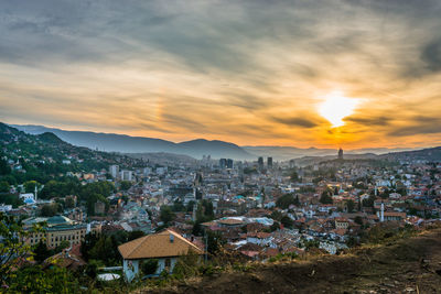 High angle view of townscape against sky during sunset