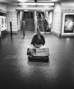 Man on woman in illuminated room