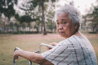 Portrait of senior woman at park