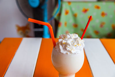 Close-up of drink served on table