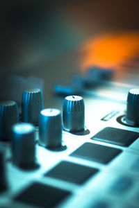 Close-up of sound mixer at studio