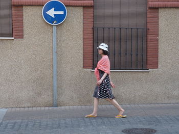 Woman walking on street