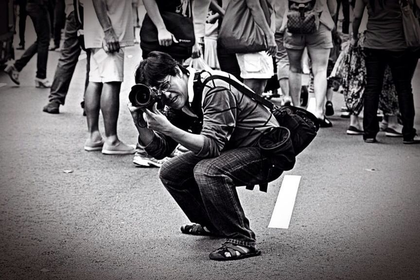 lifestyles, men, casual clothing, togetherness, leisure activity, person, full length, walking, street, standing, bonding, friendship, large group of people, low section, road, boys, rear view, city life