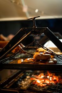 Close-up of meat on barbecue grill