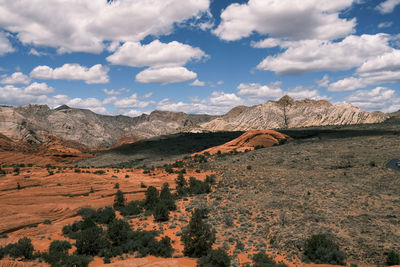 Scenic view of landscape and mountains against sky