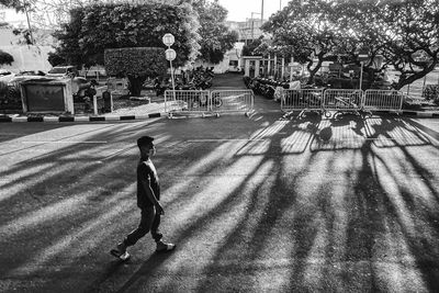 Man walking on street in city