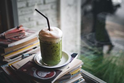 Close-up of coffee cup on table