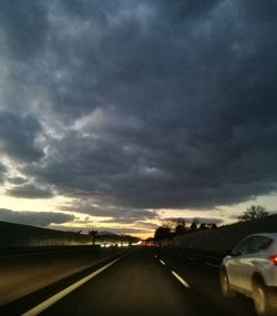 Road against sky at sunset