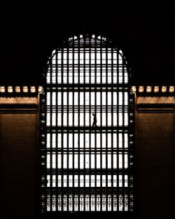 Low angle view of illuminated window in building