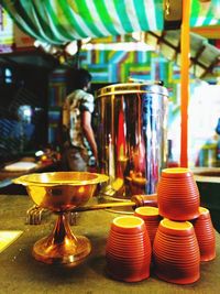 Close-up of illuminated candles in restaurant