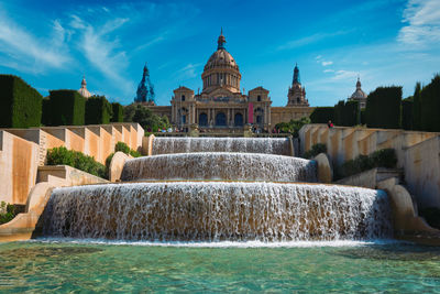 Fountain in front of historical building