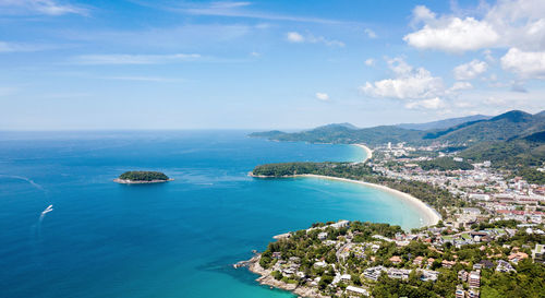 High angle view of sea and bay against sky