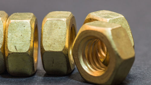 Close-up of golden nuts on table