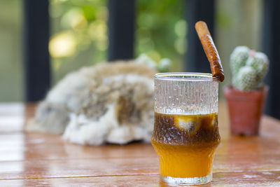 Close-up of beer glass on table