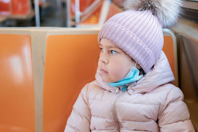 Cute young girl on the train in nyc